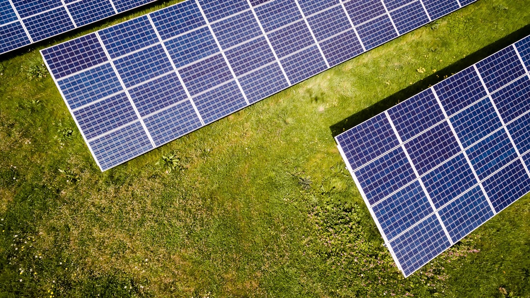 about-us Solar panels on a lawn